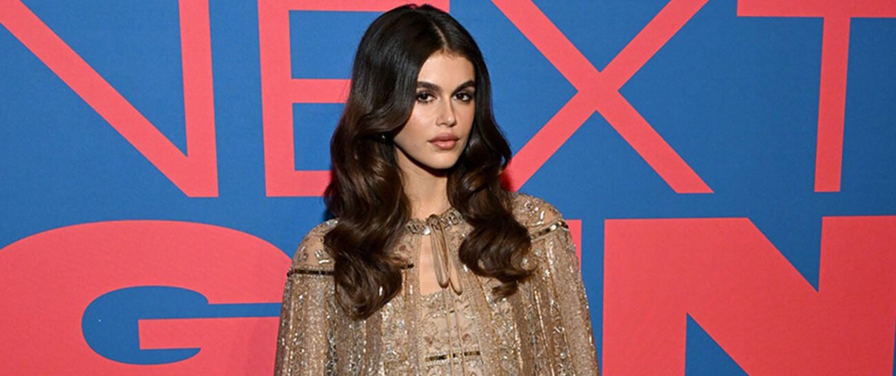 Kaia Gerber pairs opulent glitter with casual knee-highs